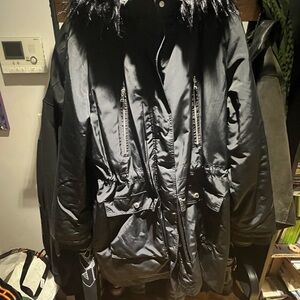 Express Black Snow Jacket with Faux Fur Trim and white leopard print inner line.